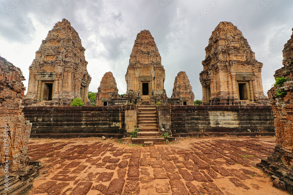East Mebon - 10th century classical Khmer pyramid temple complex built by Rajendravarman in red sandstone at Siem Reap, Cambodia, Asia East Mebon - 10th century classical Khmer pyramid temple complex built by Rajendravarman in red sandstone at Siem Reap, Cambodia, Asia