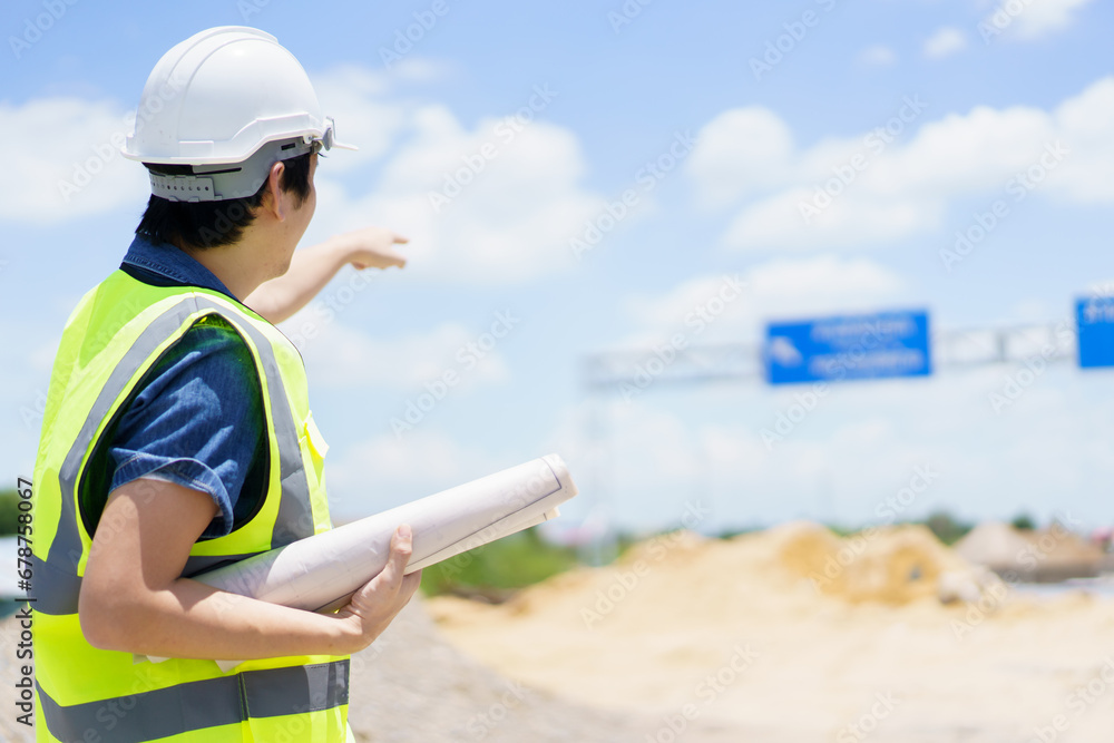 Civil engineer working at bridge construction site. Civil engineer working at bridge construction site.