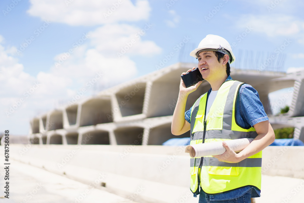 Civil engineer working at bridge construction site. Civil engineer working at bridge construction site.