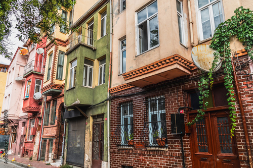 Old cozy narrow streets with colorful houses in the Fatih Balat district of Istanbul.