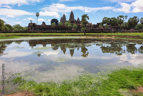 Angkor Wat Temple Complex reflected in the lake at Midday - UNESCO World Heritage 12th century masterpiece of Khmer Architecture built by Suryavarman II at Siem Reap, Cambodia, Asia © InnerPeace