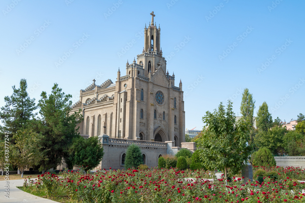 Fototapeta premium View of the Polish Catholic Cathedral of the Sacred Heart of Jesus on a sunny September day. Tashkent, Uzbekistan