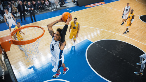 Φωτογραφία Cinematic College Basketball Tournament: Two Young Successful Diverse Teams Play a Championship Match in a Modern Arena