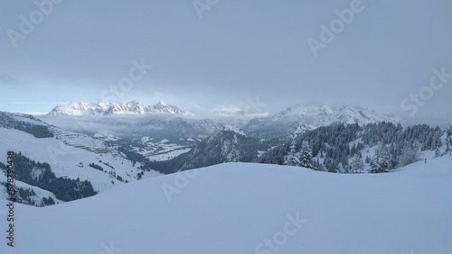 Snowy mountain peaks on a gloomy day