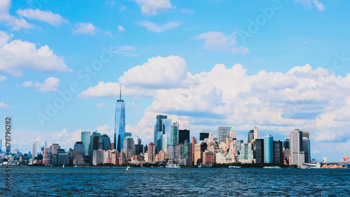 New York City Lower Manhattan and Midtown Skyline from New Jersey, Hudson River. Lower Manhattan in a sunny day. The panoramic vista of Manhattan's towering skyscrapers from the New Jersey side.