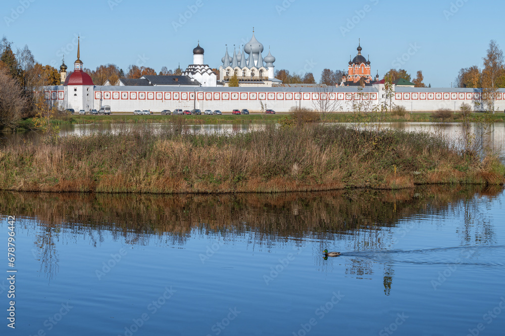 Sunny October day on Tabory lake at the Tikhvin Assumption Monastery. Leningrad region, Russia