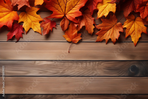 Fall Leaves on Wooden Surface Background