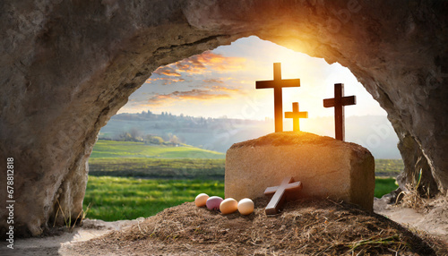 crucifixion and resurrection empty tomb of jesus with crosses in the background easter or resurrection concept he is risen happy easter © Florence