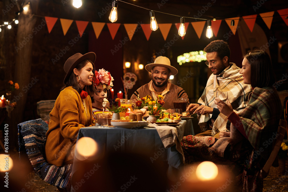 People having dinner party together in honour of holiday of dead People having dinner party together in honour of holiday of dead