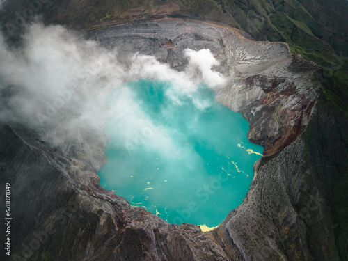 Java's Volcanic Gem: Aerial View of Mount Ijen and the World's Largest Highly Acidic Lake. Embark on a Natural Adventure in Indonesia, Asia's Premier Vacation Destination