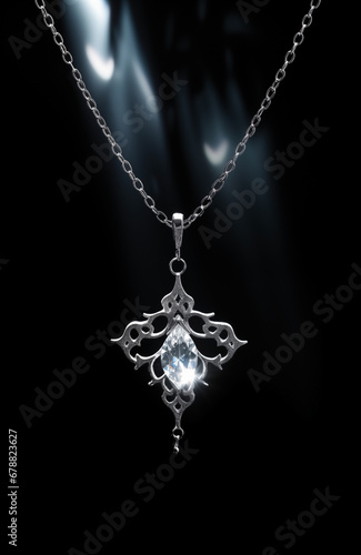 diamond necklace on black background - fantasy necklace hanging from chain - isolated - glamour delicate details