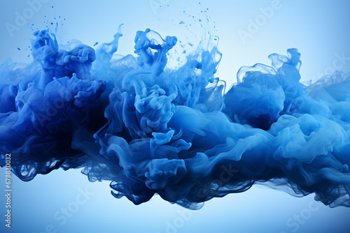 Soft blue ink dispersion in water against light background