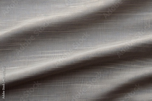 Smooth grey fabric with subtle linear texture and soft shadows