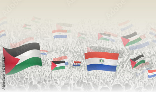 Palestine and Paraguay flags in a crowd of cheering people.