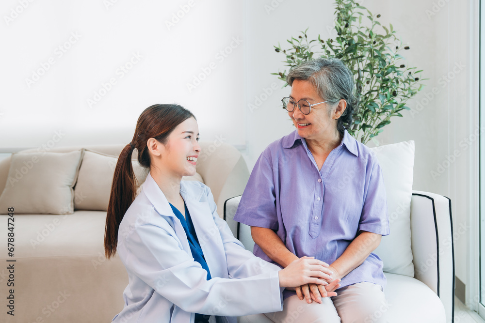 Fototapeta premium Medical staff taking and caregiver senior woman in Home. Healthcare and Home Care Concept. Female professional doctor.
