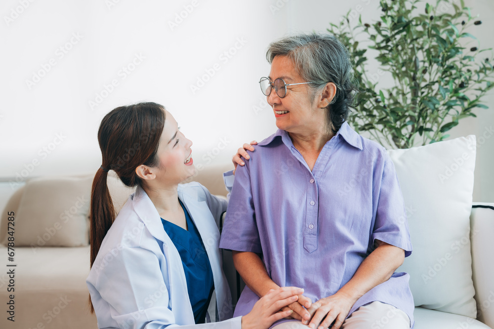 Fototapeta premium Medical staff taking and caregiver senior woman in Home. Healthcare and Home Care Concept. Female professional doctor.