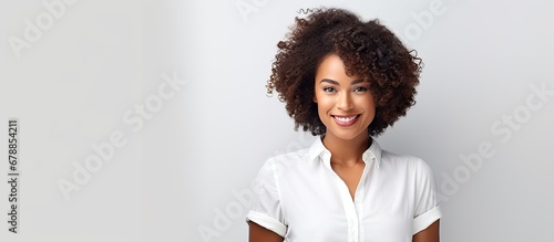 modern office a happy African woman with a fashionable sense of style stood out against the white background as people admired her confident work ethic and modern lifestyle