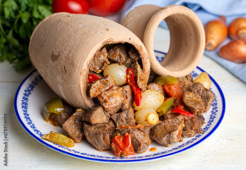 Authentic Turkish Testi Kebab cooked in earthenware waterjug, Turkish name; Testi kebabi photo