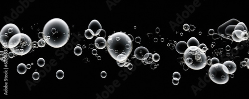 Water drops or oil bubbles on black background. panorama picture..