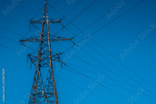 Autumn with electricity old poles and wires. In the meadow that goes home.