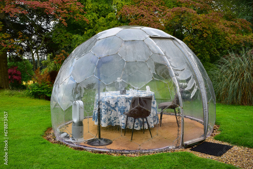 Outdoor dome shaped dining pod, table for two