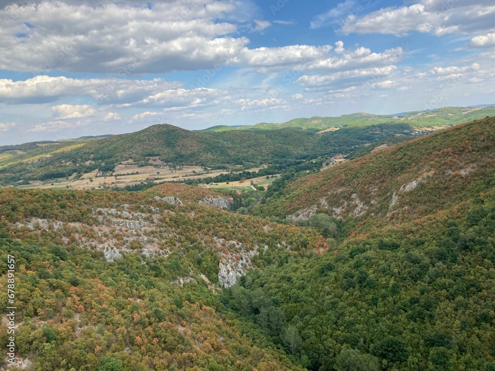 Scenic shot of the mountains in Planina, Postojna on a sunny day