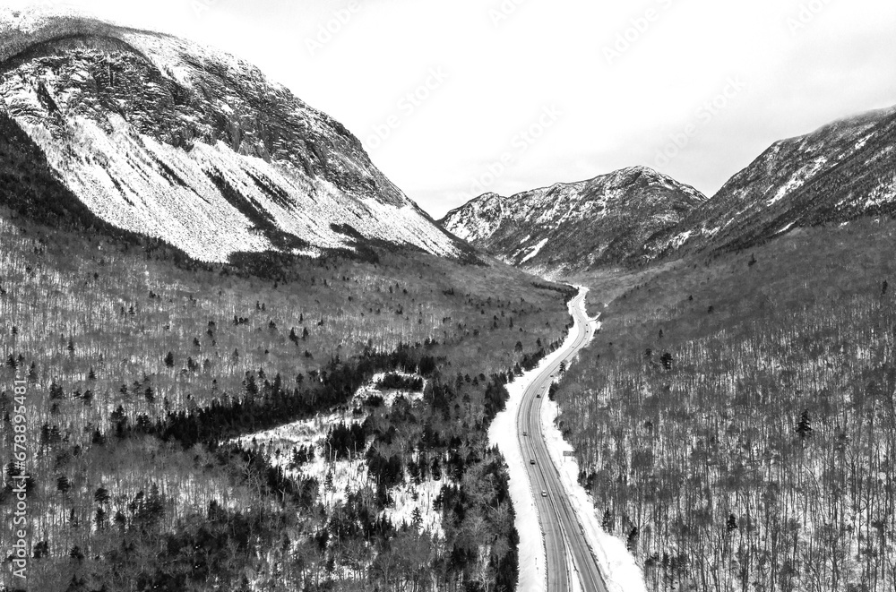 Black and white aerial image of Franconia Notch, New Hampshire during winter 