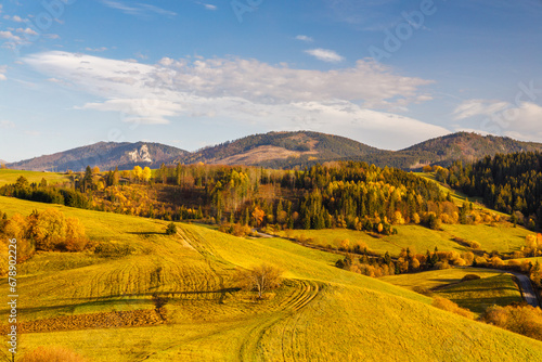 Autumn sunny rural landscape with mountains at background. The Orava region of Slovakia, Europe. © Viliam