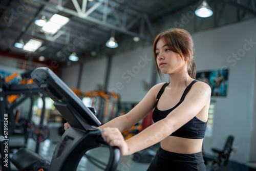 young woman cycling exercise
