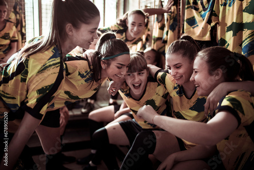 Youth Soccer Team Sharing a Laugh in the Locker Room photo