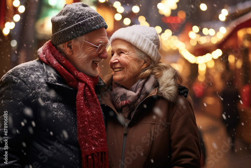 Happy couple having wonderful time on traditional Christmas market on winter evening