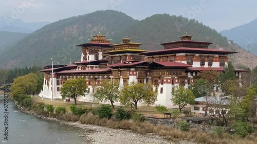 Punakha Dzong with river and green surrounding in Bhutan photo