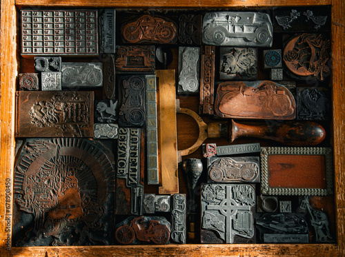 Vintage background printing press with frames and prints