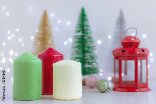 Candles and Christmas festive decor on table. decorations  celebration  winter holiday
