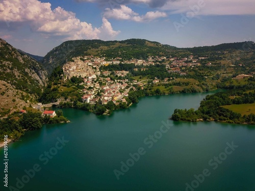 Aerial view of Villetta Barrea with rural houses by Sangro river near the Barrea Lake, Italy photo