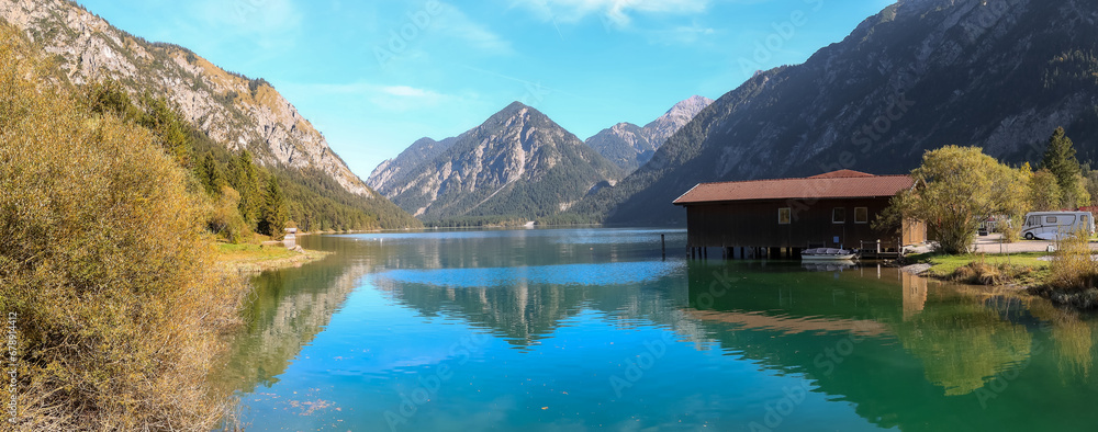 Panoramic view of Scenic Heiterwangersee lake in Austrian Alp mountains.