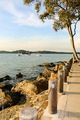 Scenic view of the shoreline featuring a body of water and a sandy beach