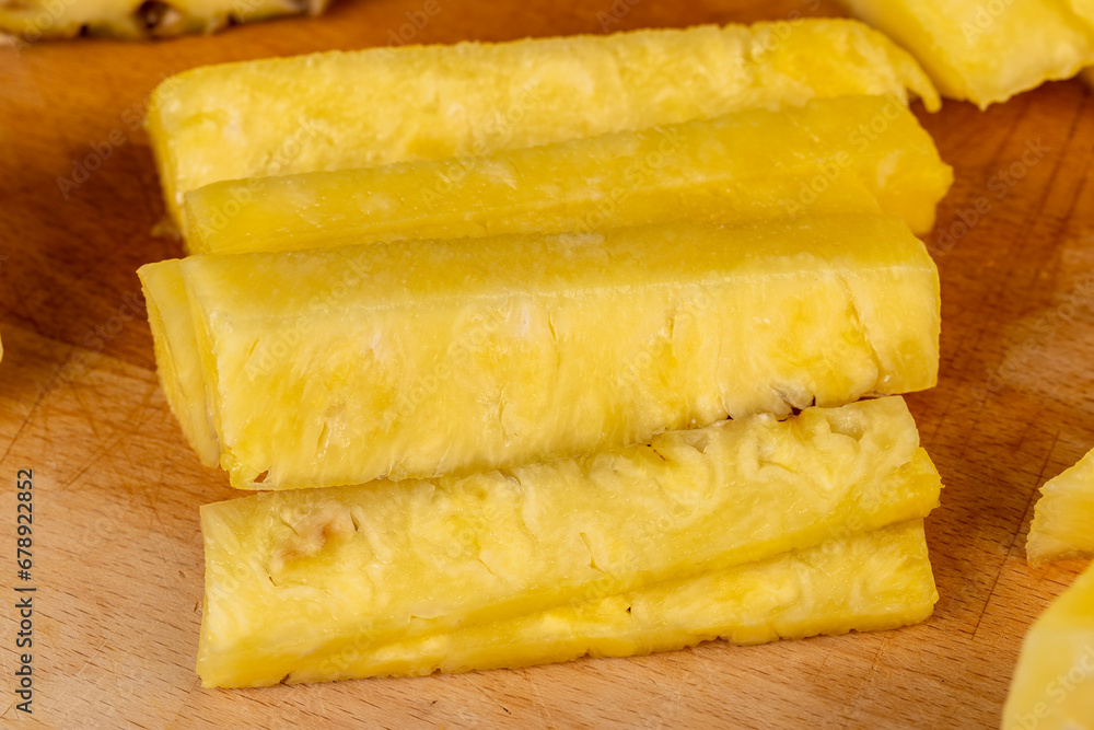 ripe yellow pineapple cut into pieces ripe yellow pineapple cut into pieces