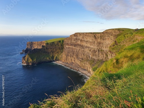 The Cliffs of Moher are sea cliffs located at the southwestern edge of the Burren region in County Clare, Ireland. They run for about 14 kilometres © John