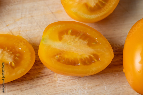 oval sweet yellow tomato, close up