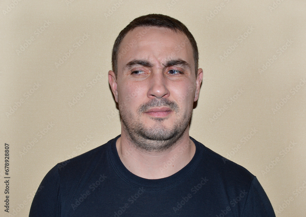 Obraz premium portrait of a young handsome man with blue eyes, light stubble and various emotions. young people leading a healthy lifestyle, open to communication, positive and friendly