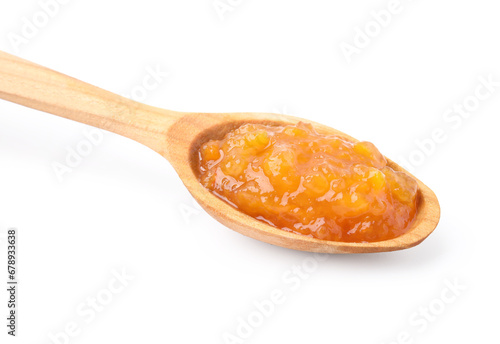 Wooden spoon with tasty apricot jam isolated on white