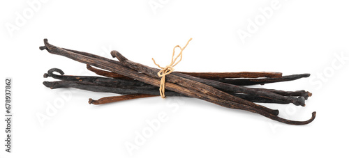 Many aromatic vanilla pods isolated on white