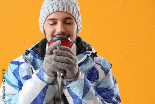 Young man in winter clothes...