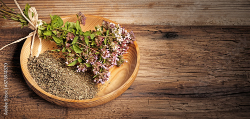 Origanum vulgare (oregano) herb - spice on a table photo