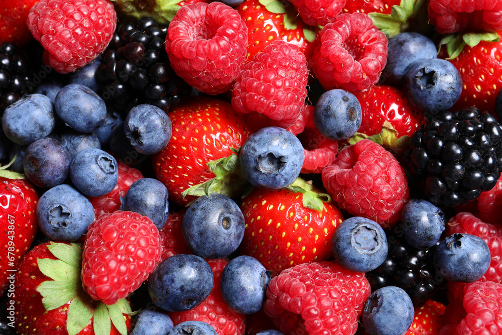 Assortment of fresh ripe berries as background, top view Assortment of fresh ripe berries as background, top view