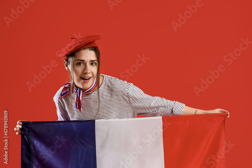 Young woman with flag of Fr...