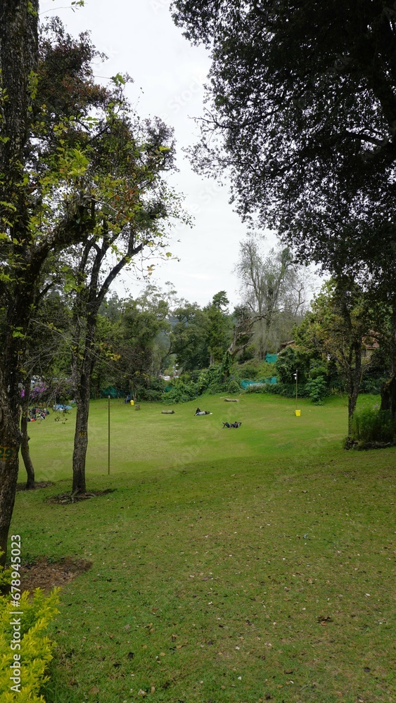 Tourists enjoying the beautiful kodaikanal Bryant park.