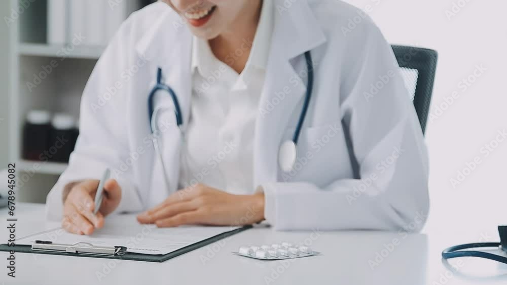 Doctor prescribes treatment to patient with bowel problems and model of unhealthy lower rectum Doctor prescribes treatment to patient with bowel problems and model of unhealthy lower rectum