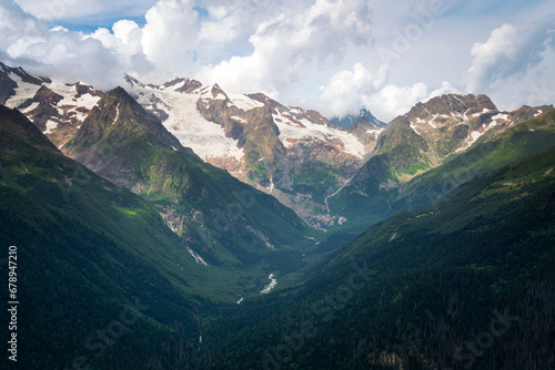 View of the Alibek Gorge, the Alibek River and the mountains of the Main Caucasian Ridge, opening from the upper station of the cable car system of the Dombay ski resort, Karachay-Cherkessia, Russia